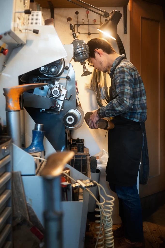 full-shot-man-making-shoes